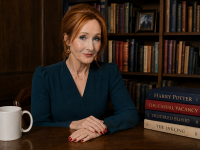 Satirical image of J.K. Rowling with a clipboard outside a public building.